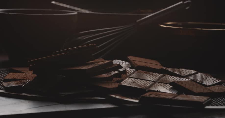 Pieces of chocolate is laid on a table