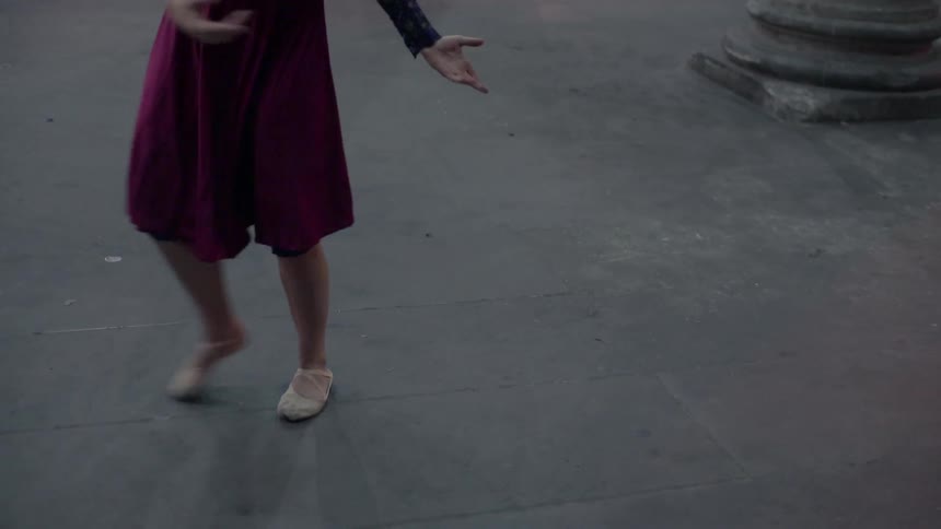 Dancers perform in a town square