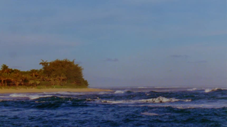 Waves crash against the shore