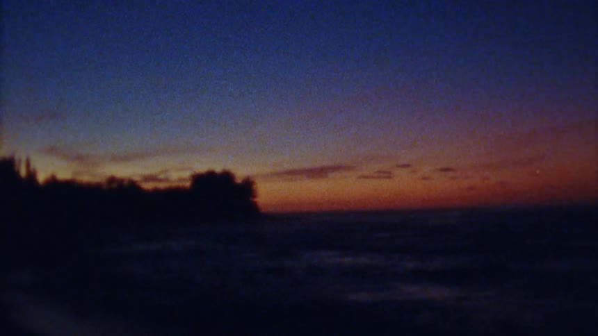 A wide shot of a horizon sunset