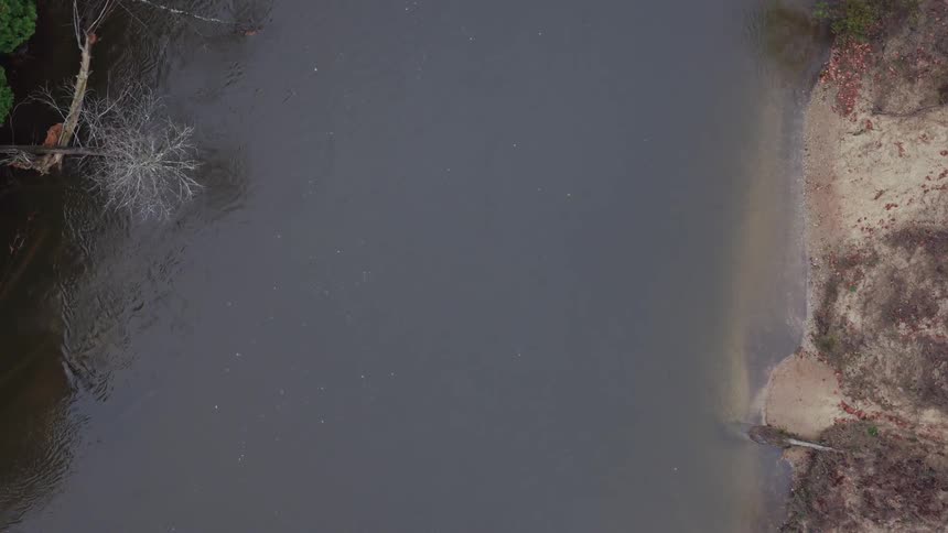 A stream below is calm