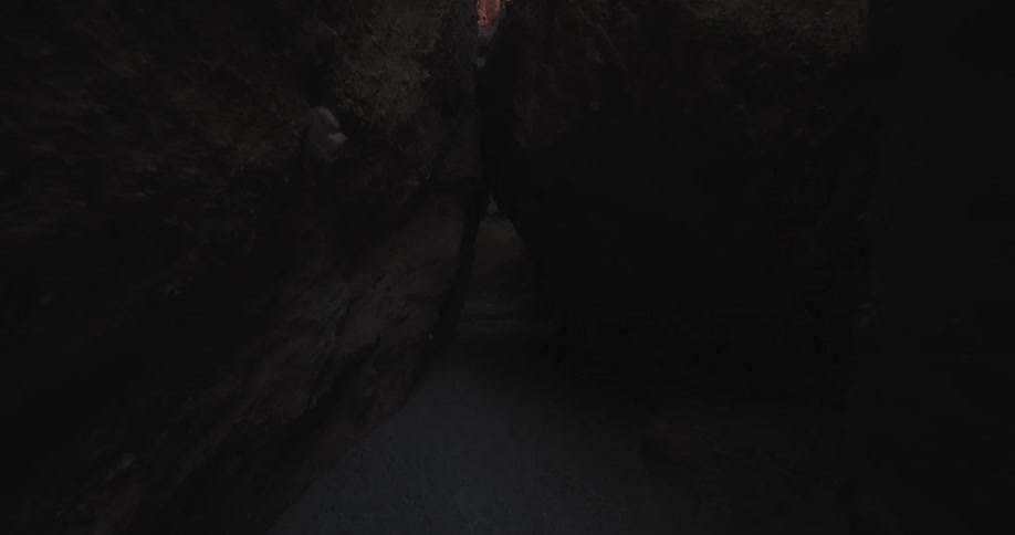 A view of inside a cave is displayed during daytime
