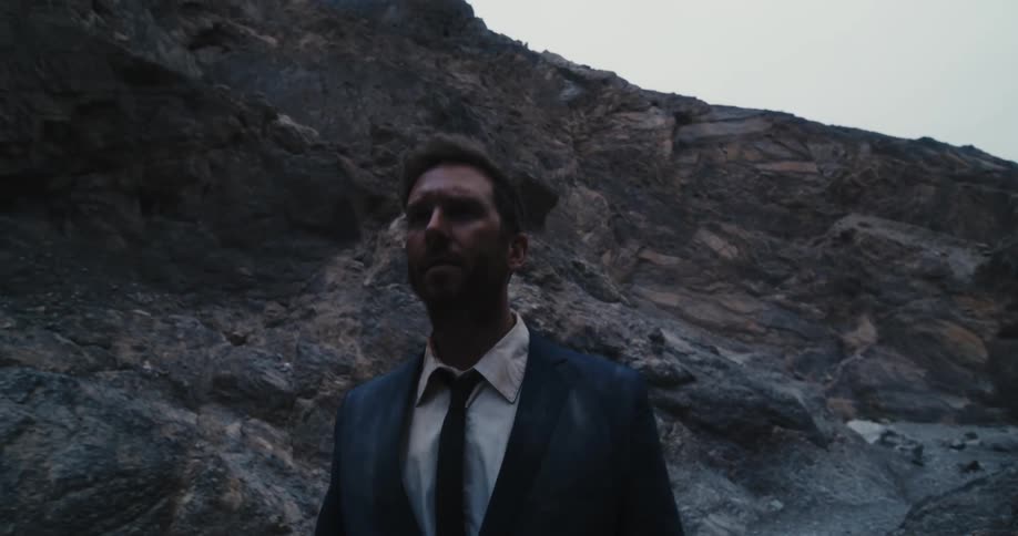 A man walking in a canyon