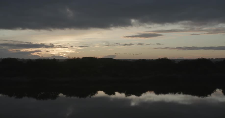 A view of a lake at dusk