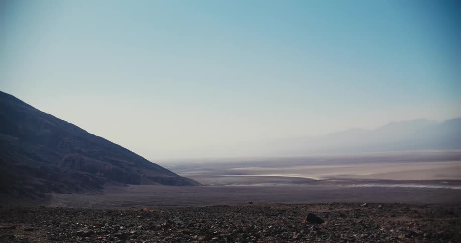 Fog densely covers area between mountains