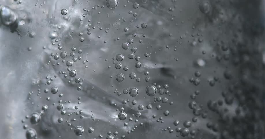 Bubbles rise in the beverage