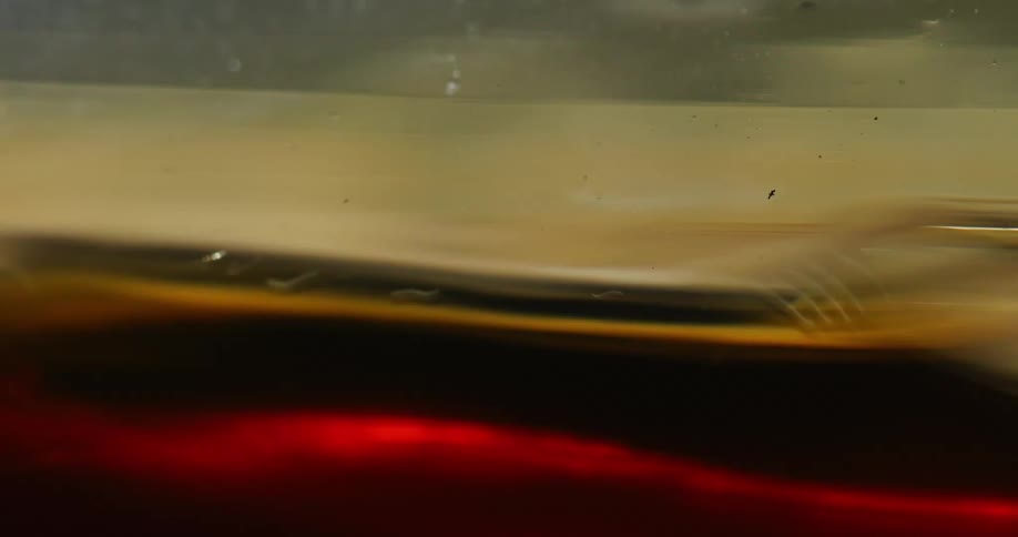 A liquid spinning with bubbles at the top