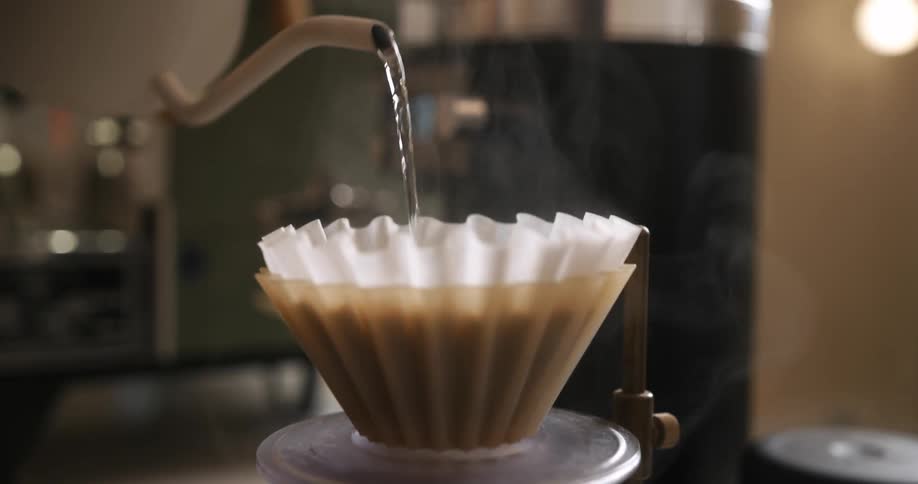A view of water being poured over coffee