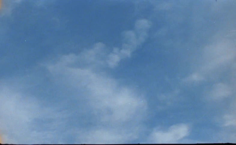 Clouds floating in a blue sky in the daytime