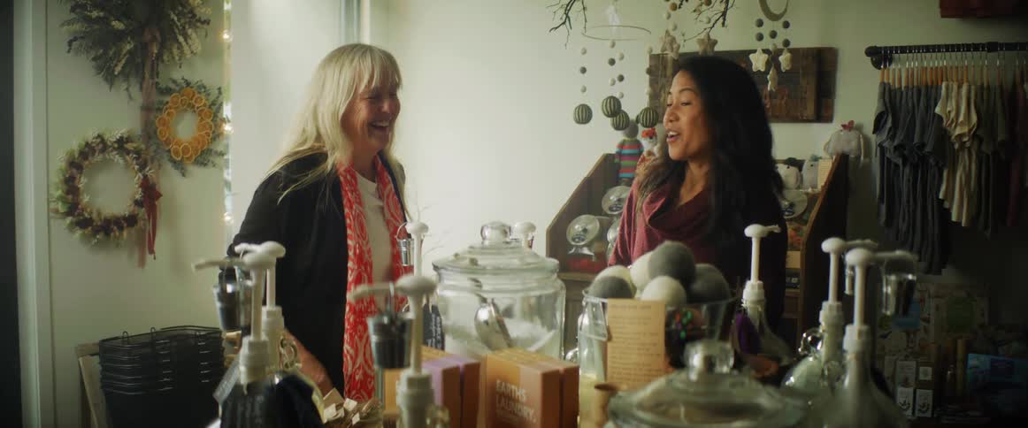Two women talking in a store