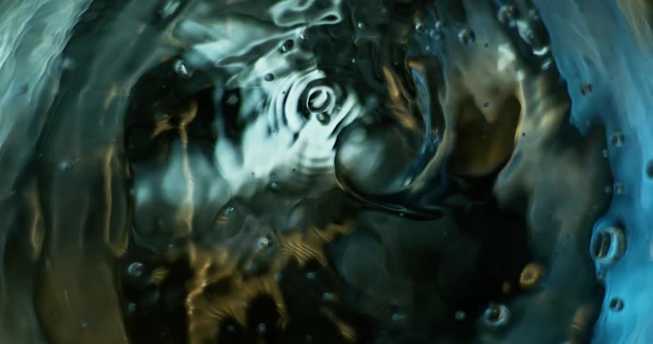 Spinning water forms eddy and bubbles