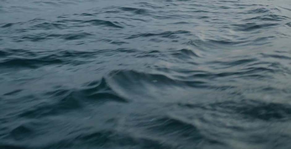 Rolling waves in a body of water