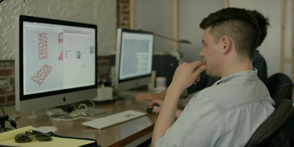 A man works at a computer