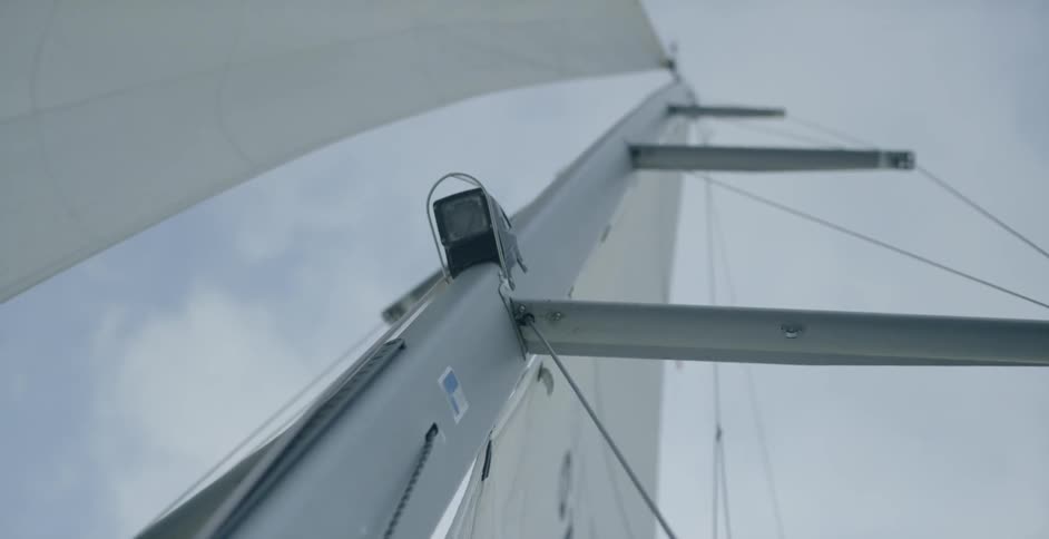 A metal pole with sails attached