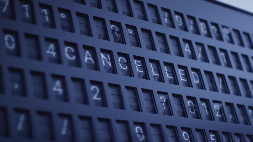 Letters flashing on a sign to spell cancelled