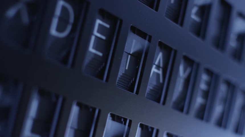 The machine displays the word delayed