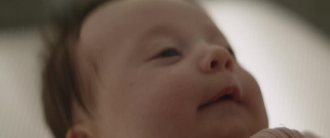 A babys head and face
