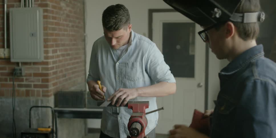 Two men in a workshop