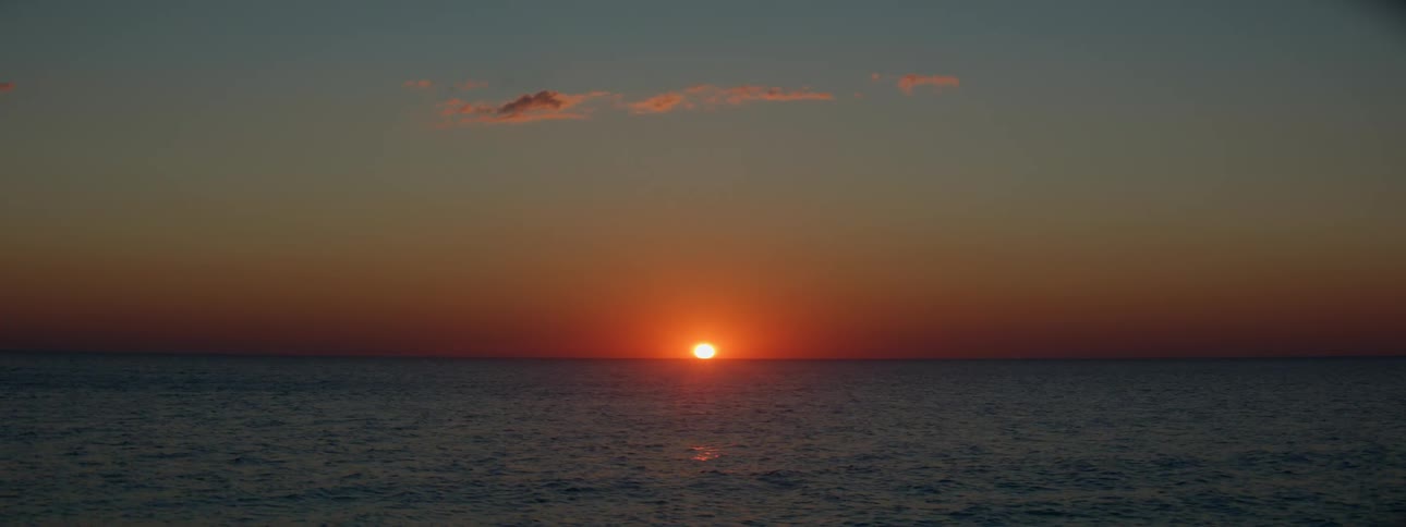 A view of the sunset at the ocean