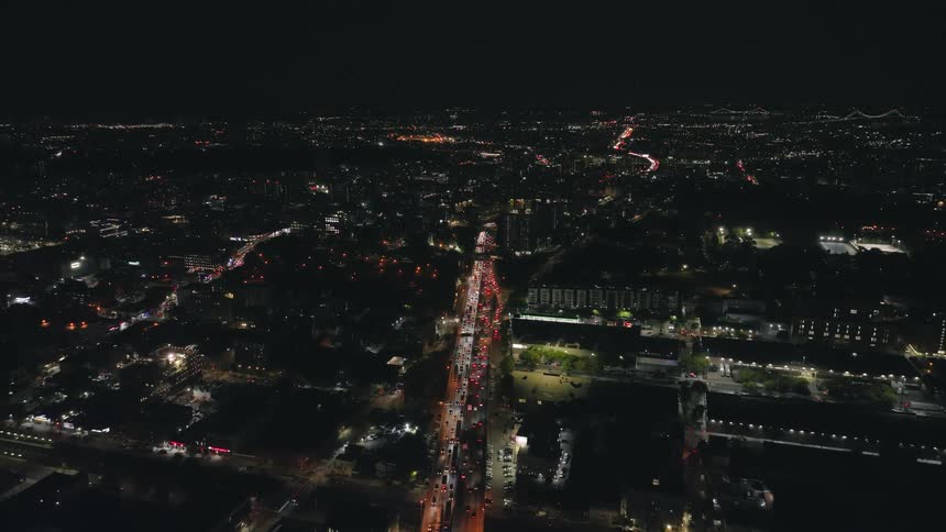 An aerial view of a crowded city at night