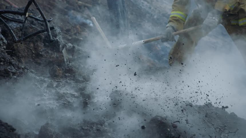 Firefighters are digging up the smoking ground