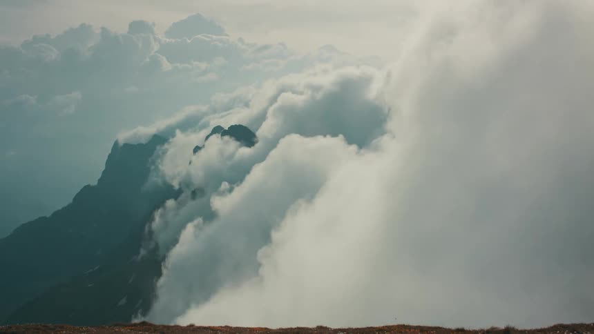 Landscape of clouds floating on mountain range