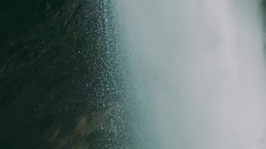 Waterfall cascades down cliffside