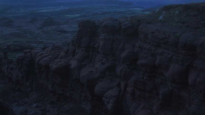 A cliff outside at night