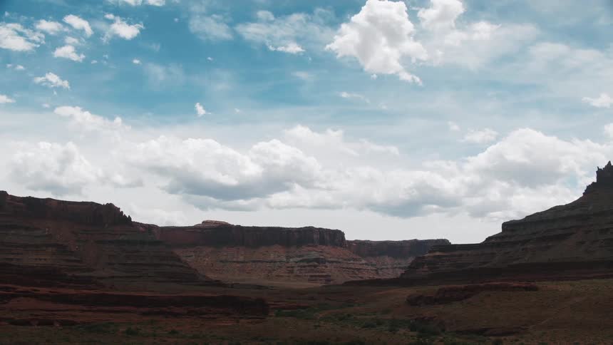Clouds move over canyons and plateaus