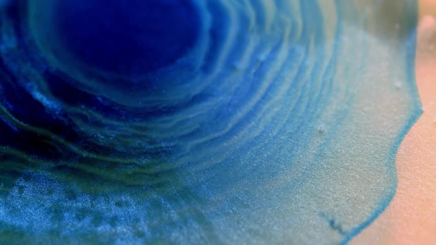 Blue ripples move outward from a tunnel as is grows and moves