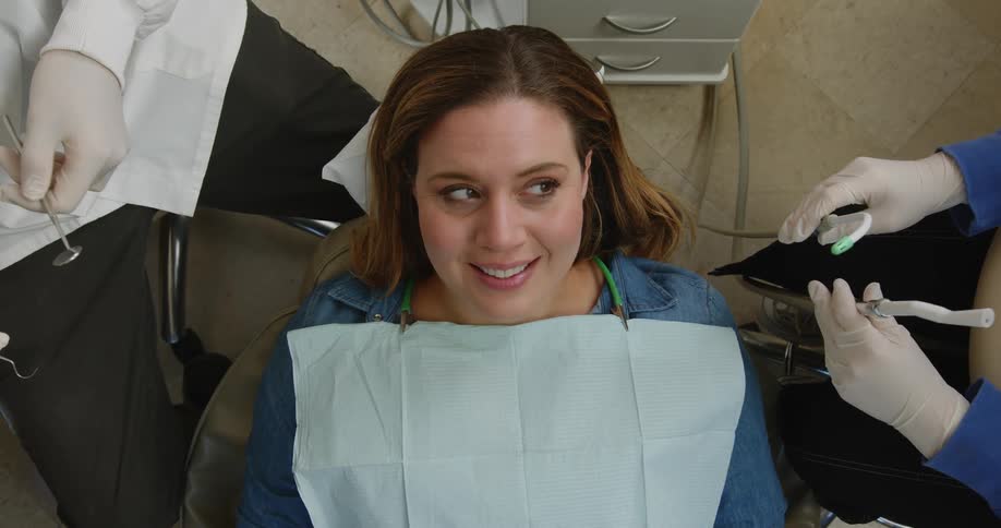 A woman in a dentist office