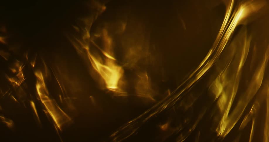 Amber syrup flows slowly downward