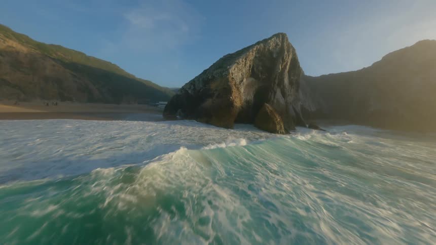 Aerial view of ocean and the cliff is displayed