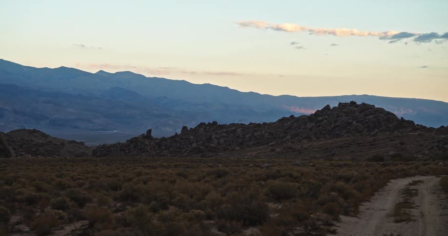 An arid shrubland in the evening
