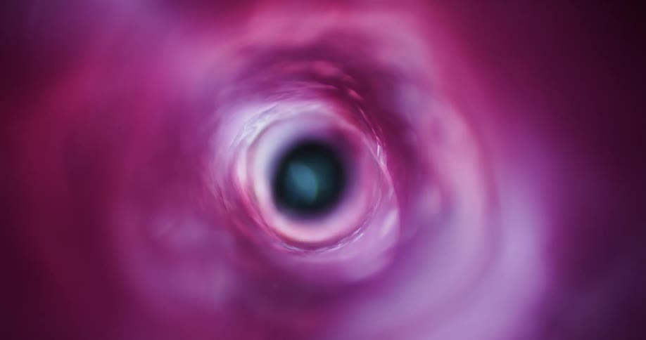 A hole grows larger in a black background