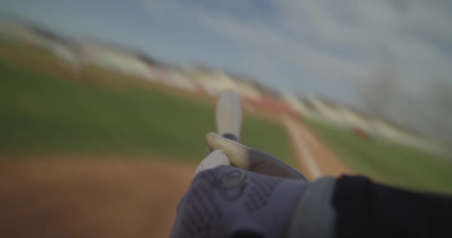 A baseball player gets ready to bat