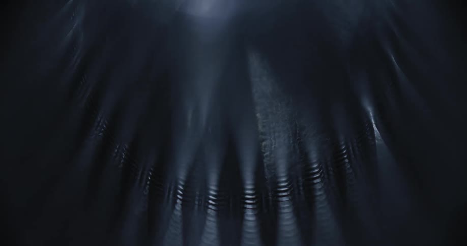 Smoke and light flow over a structure with vents
