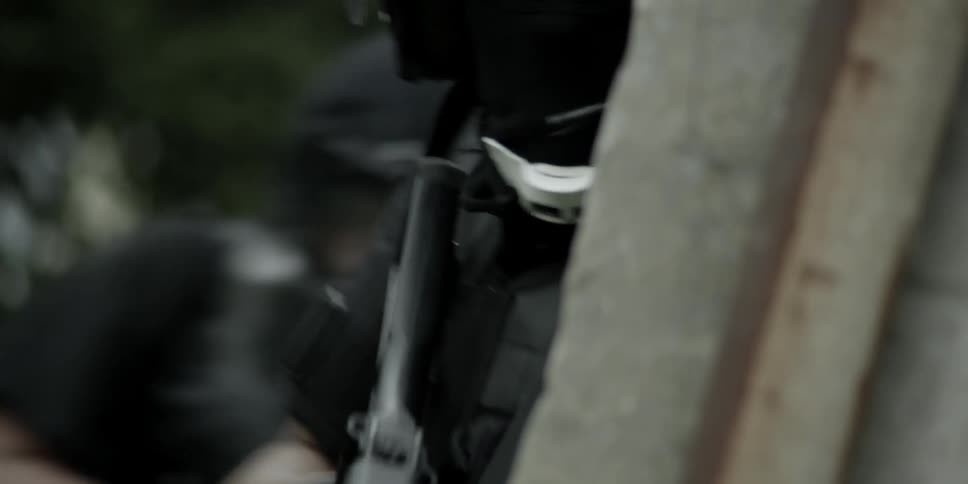 Police preparing to enter a building