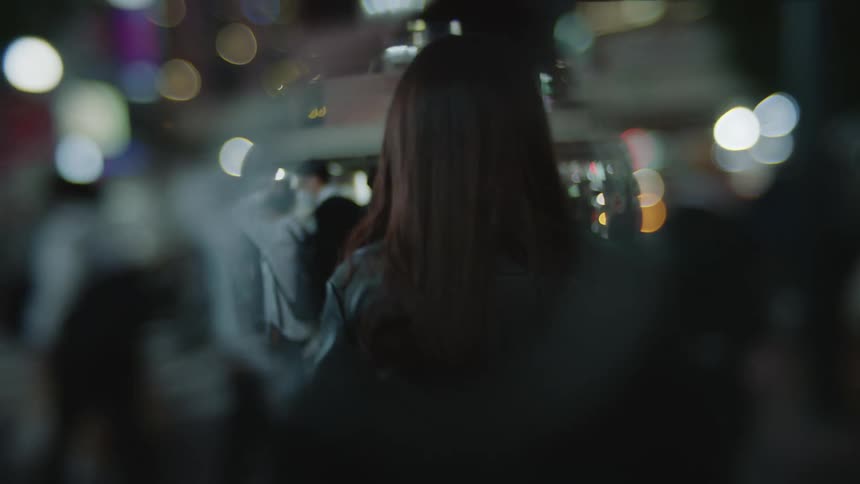 Pedestrians crossing a street in a city