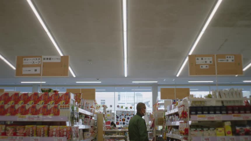 A man shopping in a grocery store