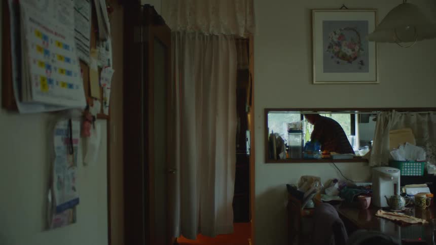 A person is cooking in the kitchen