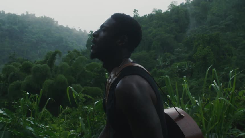 A man sweating while walking in a tropical area