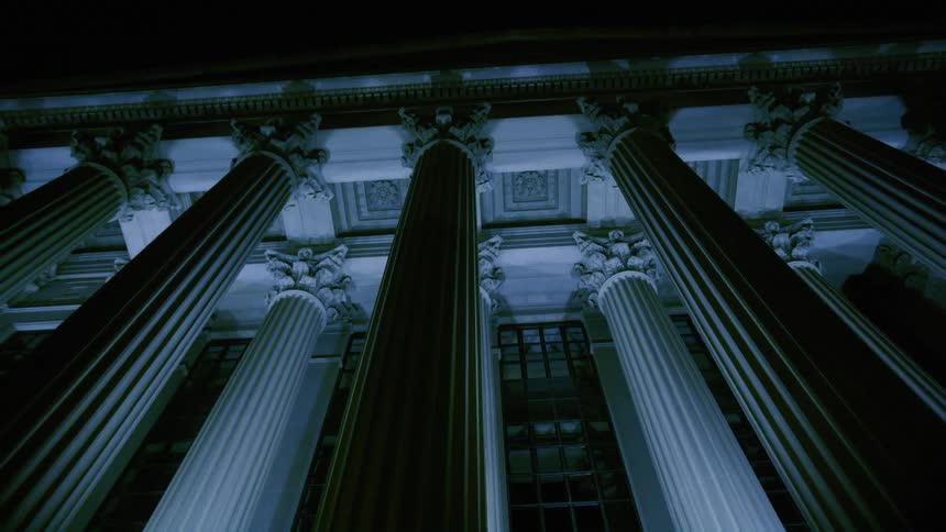 The building is lined with tall pillars