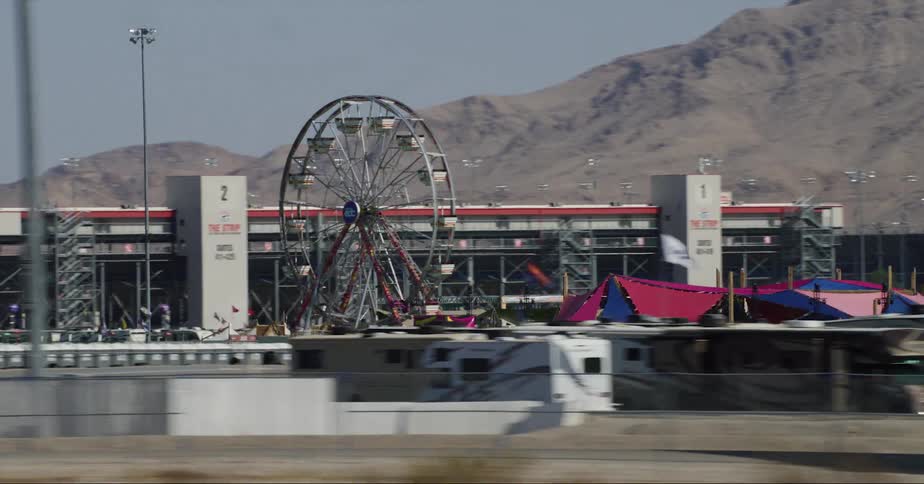 A large ferris wheel is in the carnival