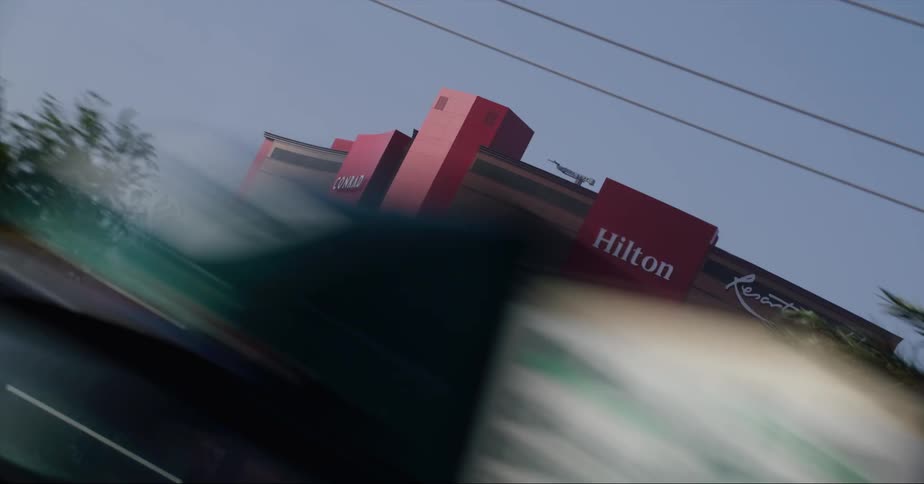 A tall hotel fills the sky