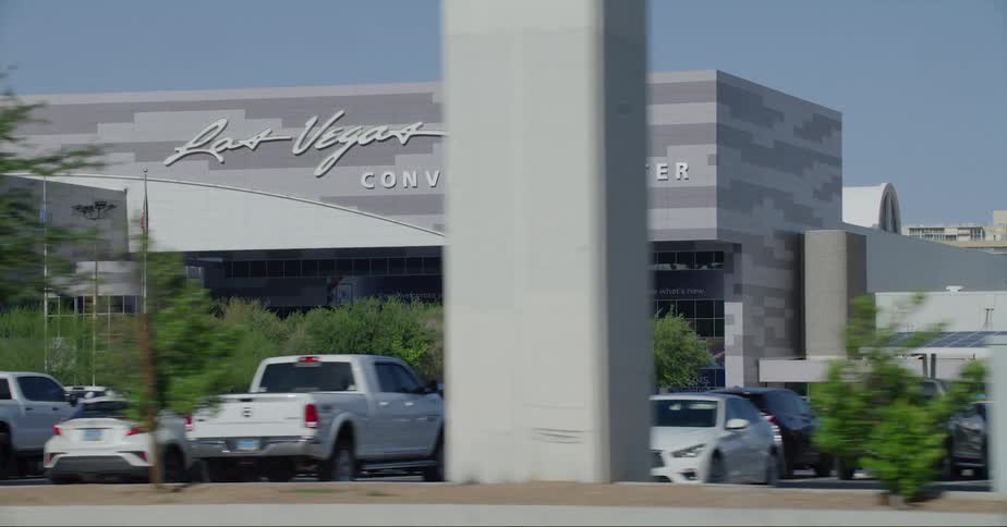 Traffic passes packed parking lot at the las vegas convention center