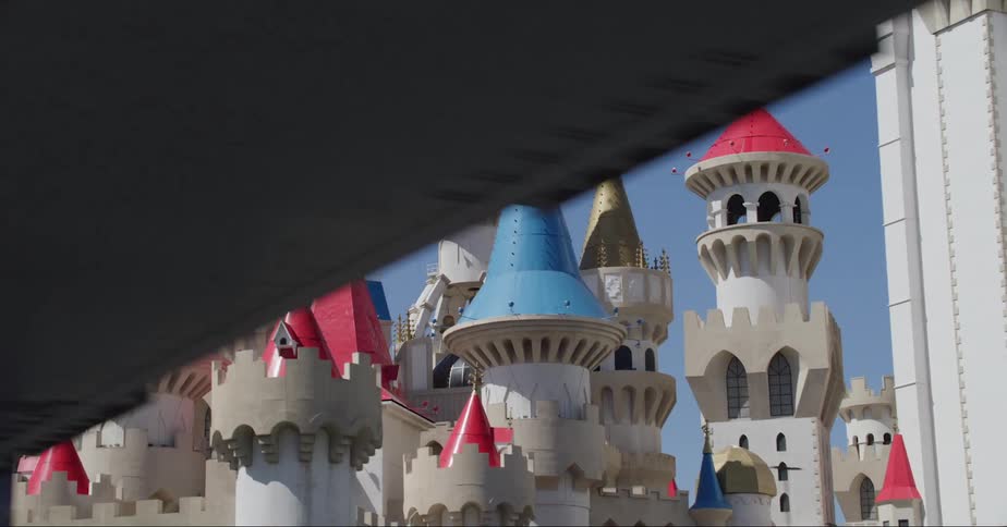 A large castle is near the overpass