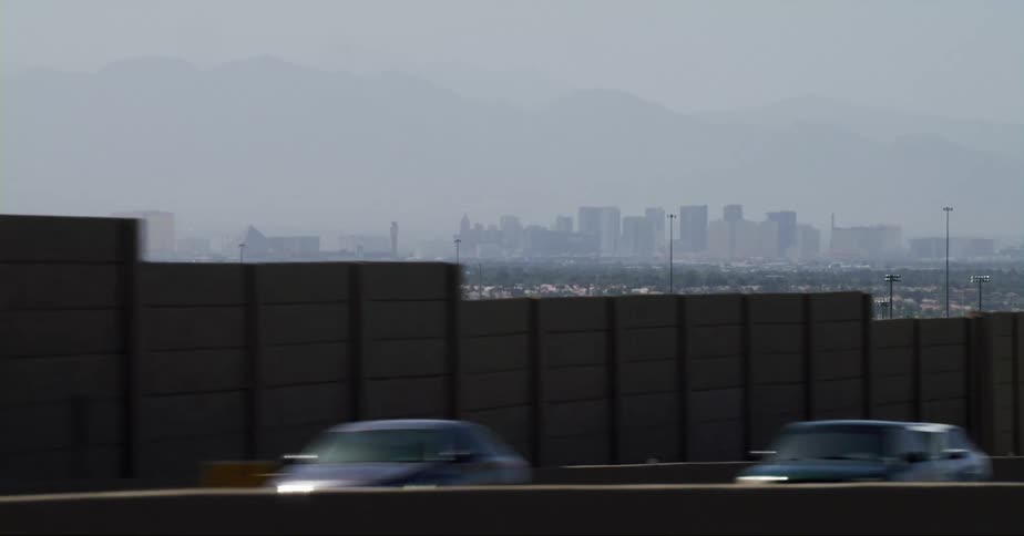A view of a city skyline in the distance
