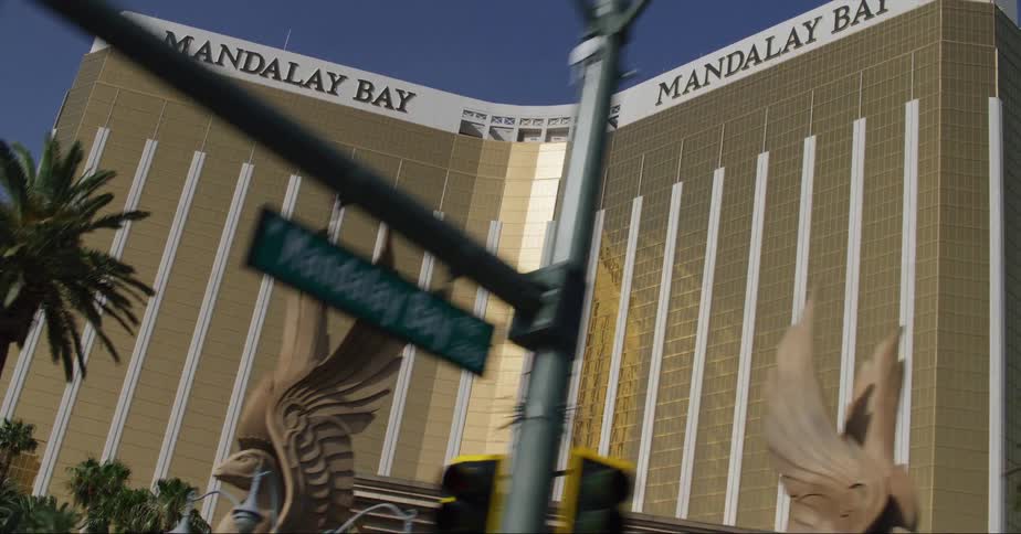 The front facade of an impressive looking casino is covered in a gold finish