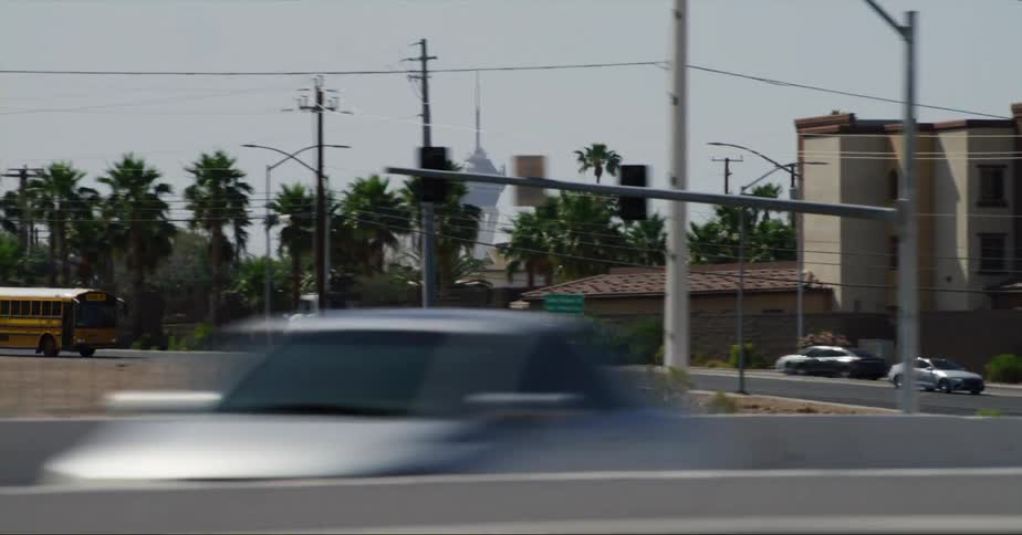 A view of cars driving down roads in a city